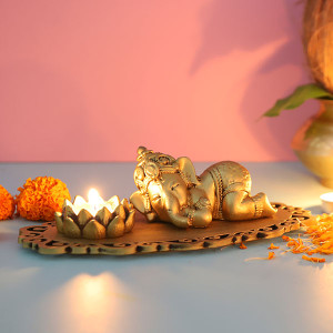 Cute Sleeping Ganesha In A Decorated Tray